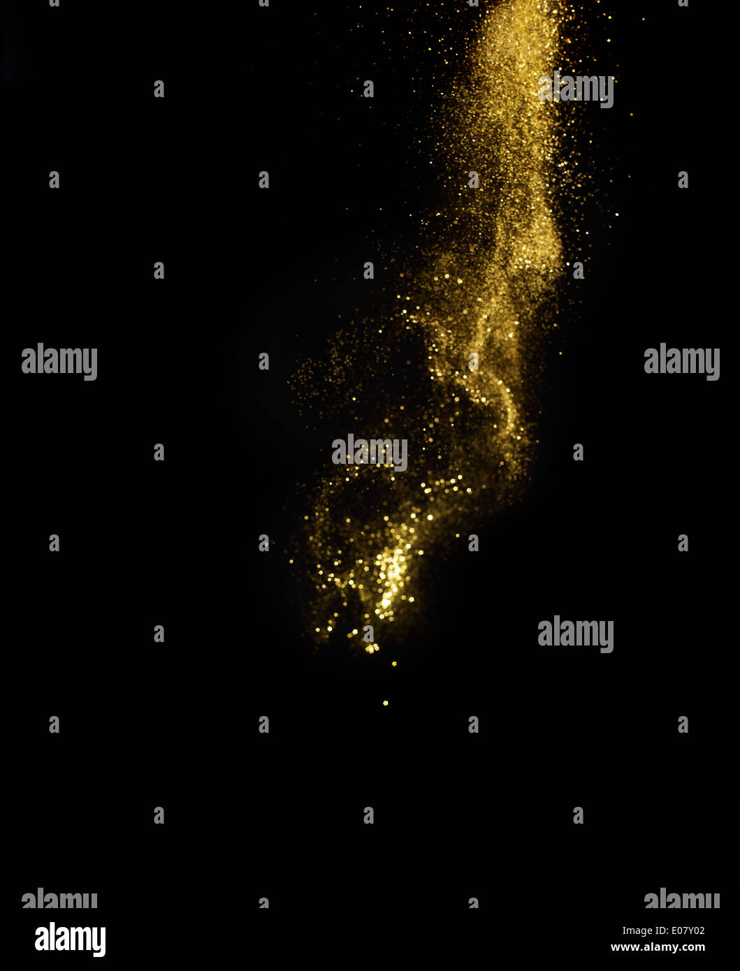 gold glitter exploding Stock Photo