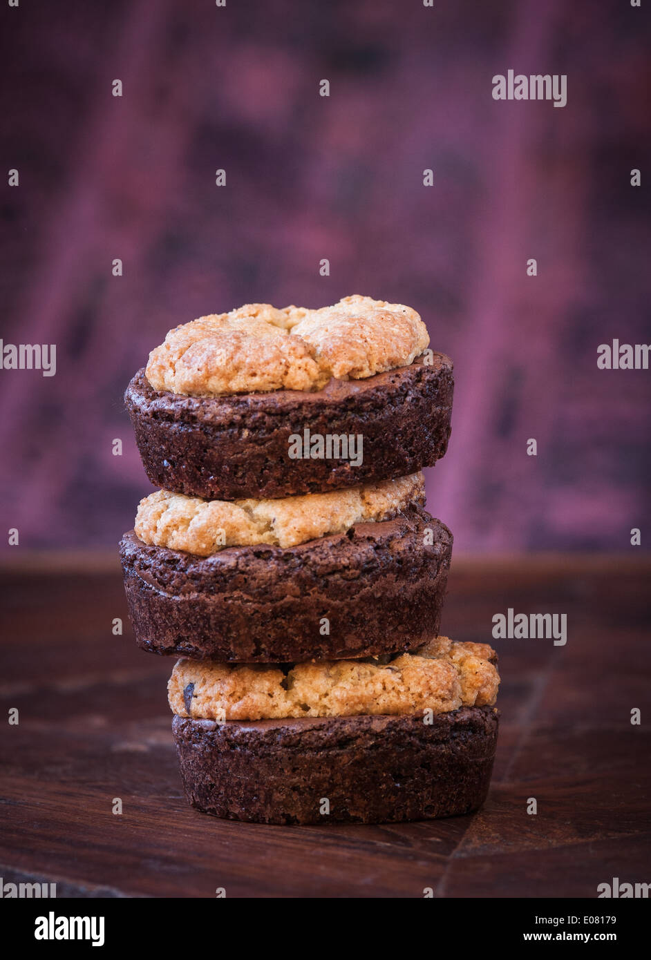 A stack of brookies made from chocolate chip cookies and brownies Stock Photo
