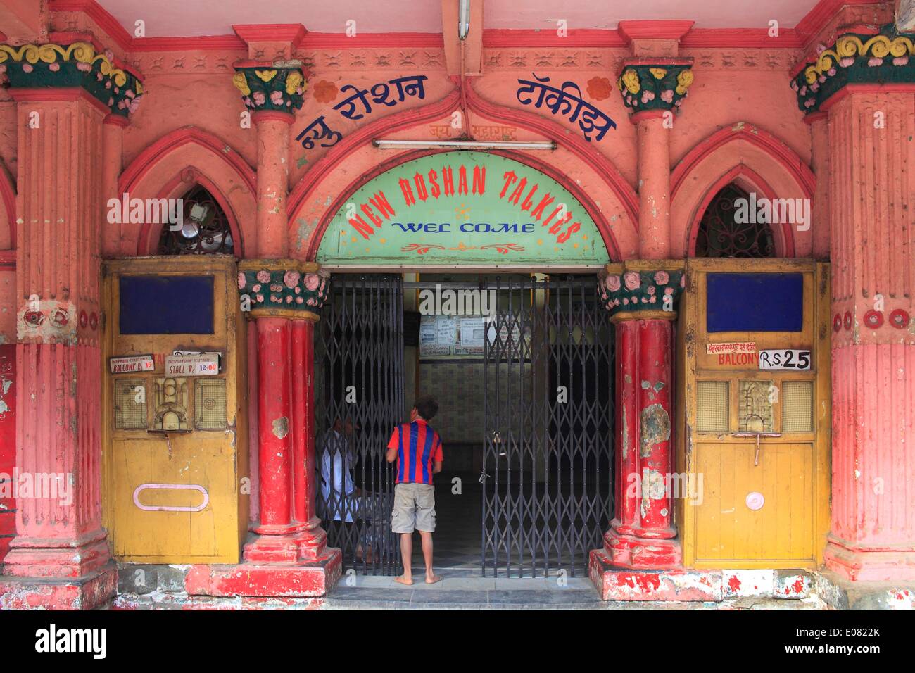 Apr 29, 2014 - Mumbai, Maharashtra, India - Tickets are prized between Rs.12 to Rs.15 at the New Roshan Talkies. This single screen cinema, which was once the go to place for poor Migrant workers of Mumbai for Bollywood movies, hardly sees the crowds nowadays. Figures from the Film Federation of India published show that the number of single-screen cinemas in the country fell from 13,000 to about 10,000 over a five-year period to 2012. They are continuing to shut down or are being converted to Multiplexes - with plush seats and a wide range of food on offer to adapt to the tastes of the intern Stock Photo