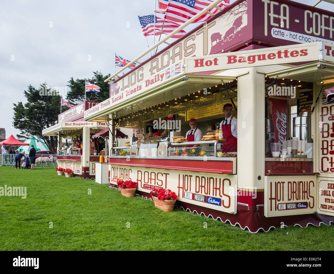Mobile catering units awaiting customers at an outdoor festival event