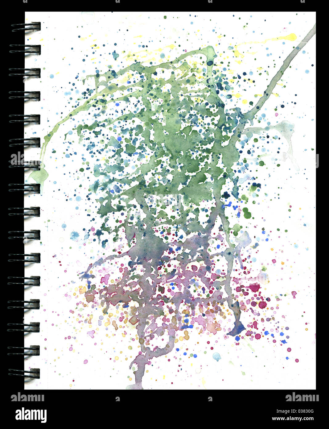 Splatter pad watercolor texture on a notepad isolated on black