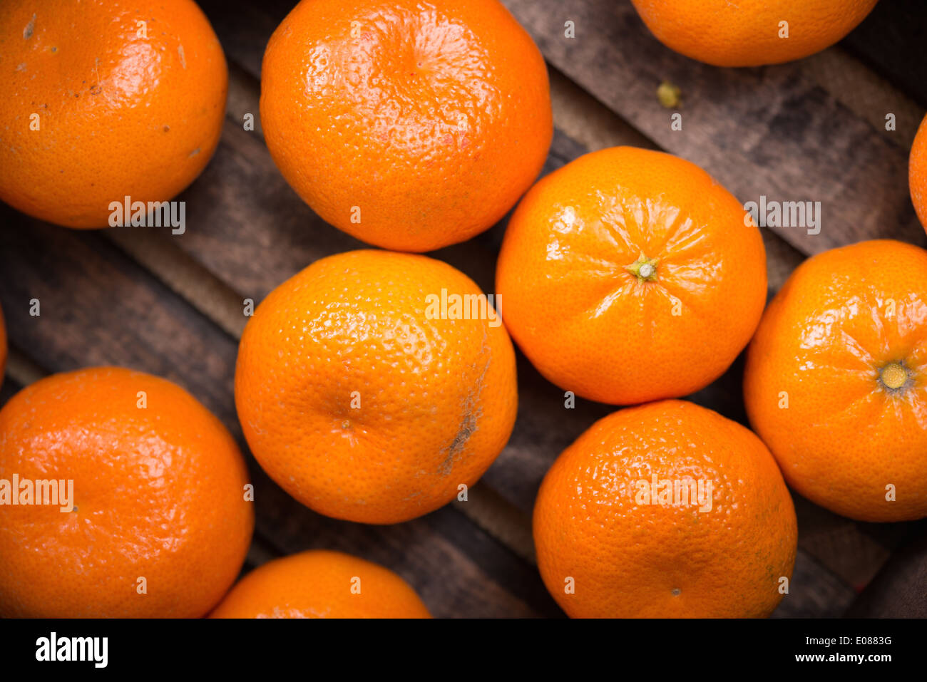 Organic Mandarin Oranges in Dark Wooden Crate Stock Photo Alamy