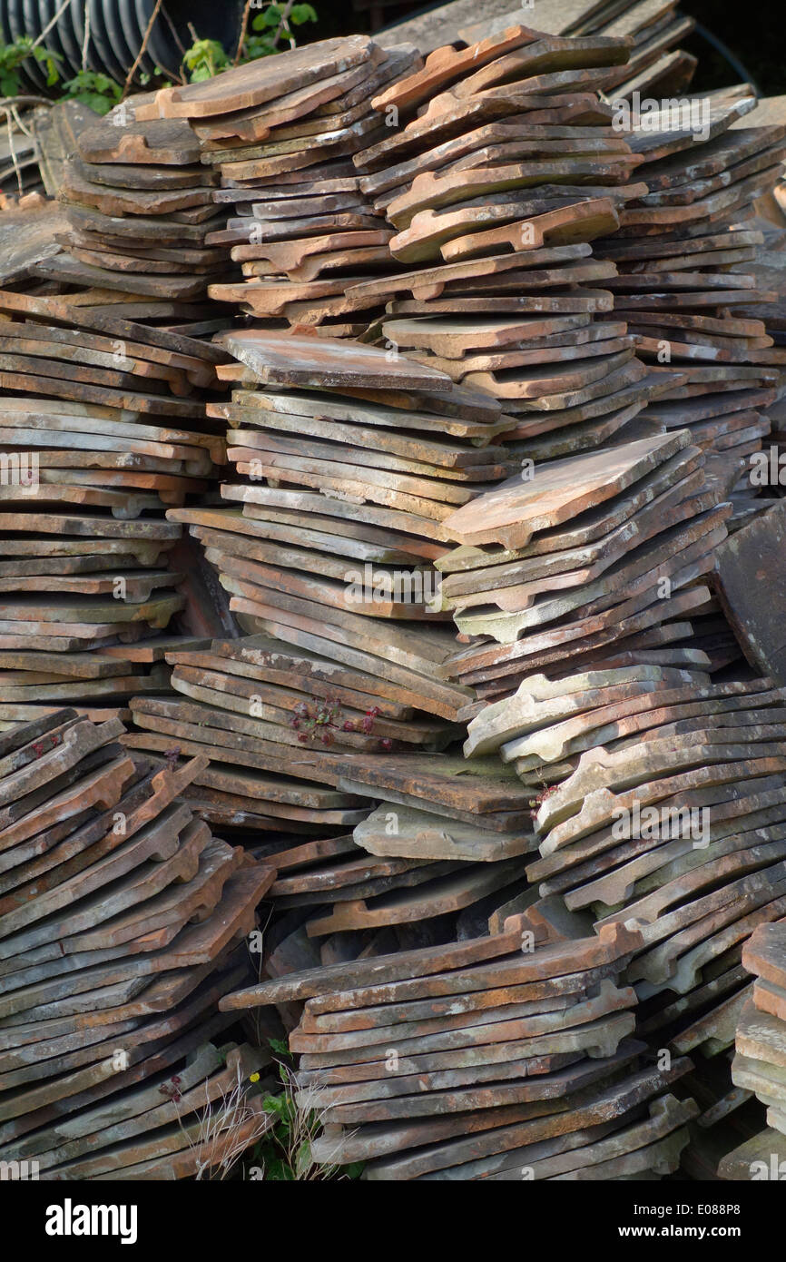 Reclaimed roofing tiles for recycling and reuse on repair and replacement work Stock Photo