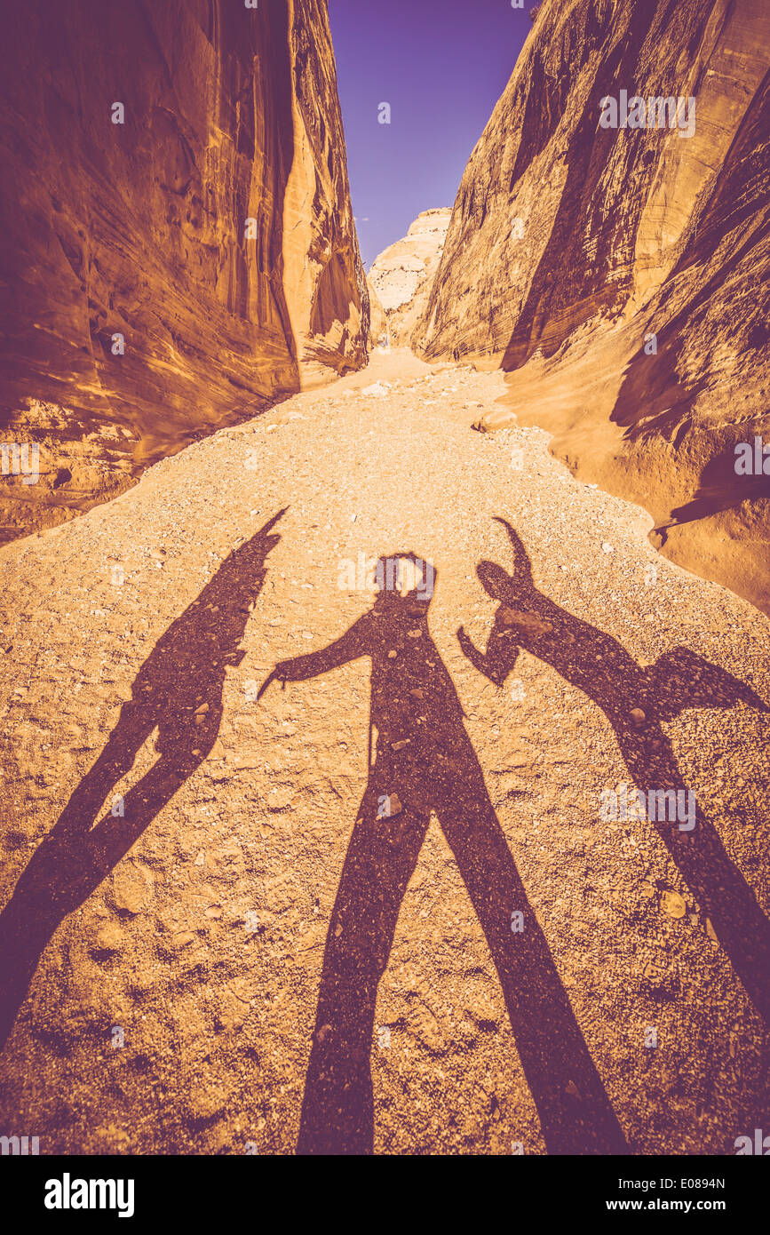 Utah Canyon Fun. Funny People Shadows in Grand Wash, Capitol Reef National Park in Utah, United States. Stock Photo
