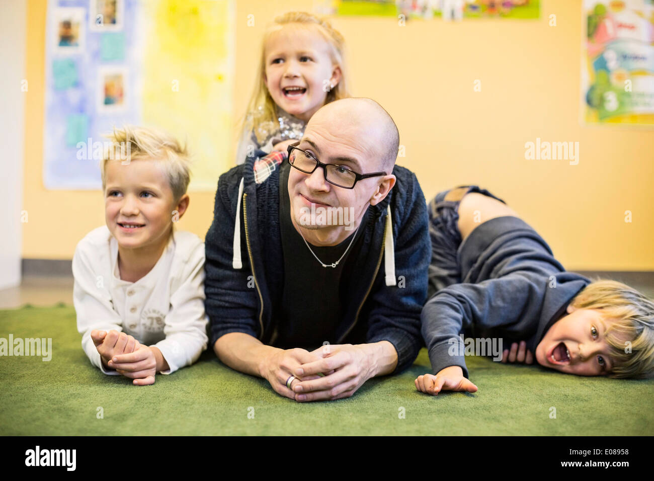 Children and teacher hi-res stock photography and images - Alamy