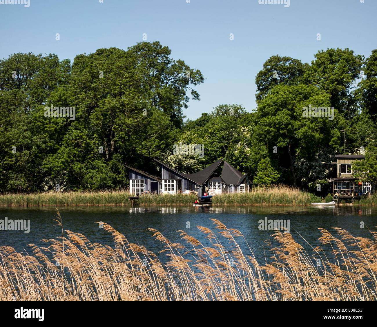 Christiania, Copenhagen, Denmark. Architect: Unknown, 1971. House by the lake in Christiania. Stock Photo
