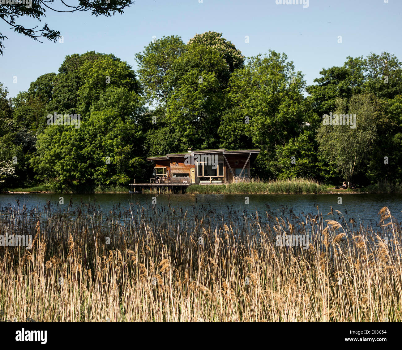 Christiania, Copenhagen, Denmark. Architect: Unknown, 1971. House by the lake in Christiania. Stock Photo