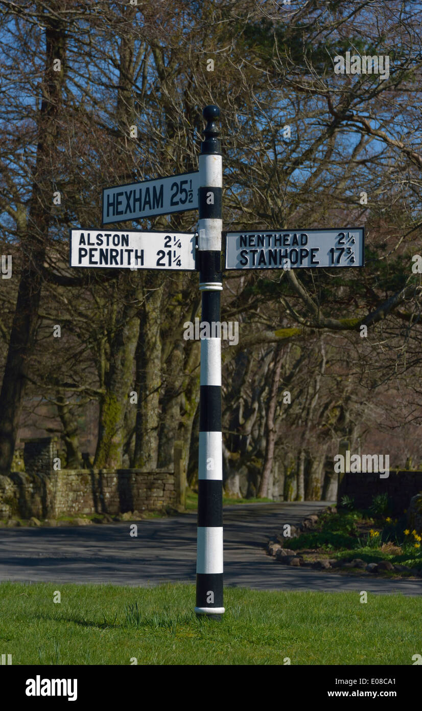 Road signpost on the A689. Hudgillburn Bridge, Nenthall, Cumbria ...