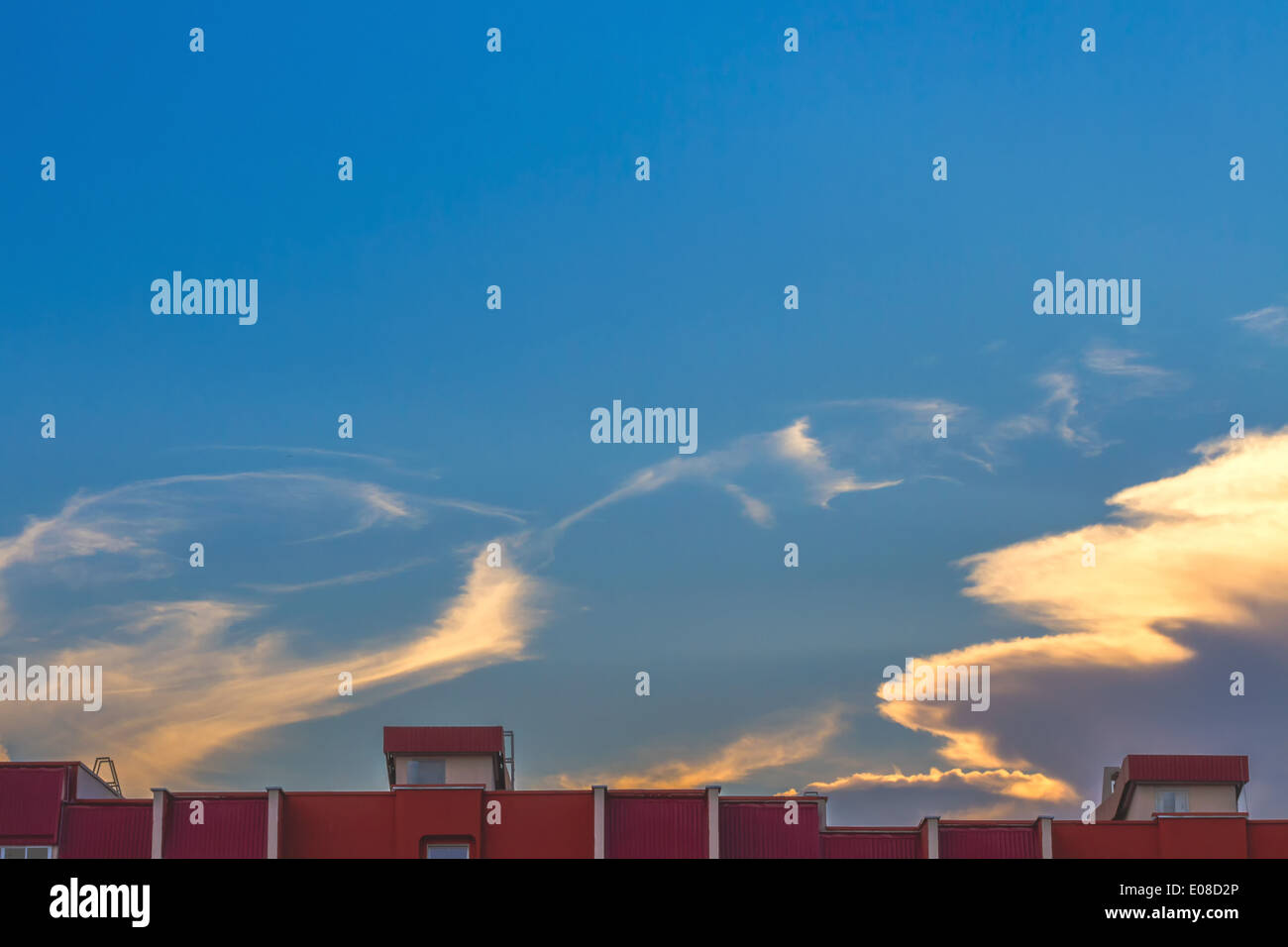 Clouds on blue sky background at sunset Stock Photo - Alamy