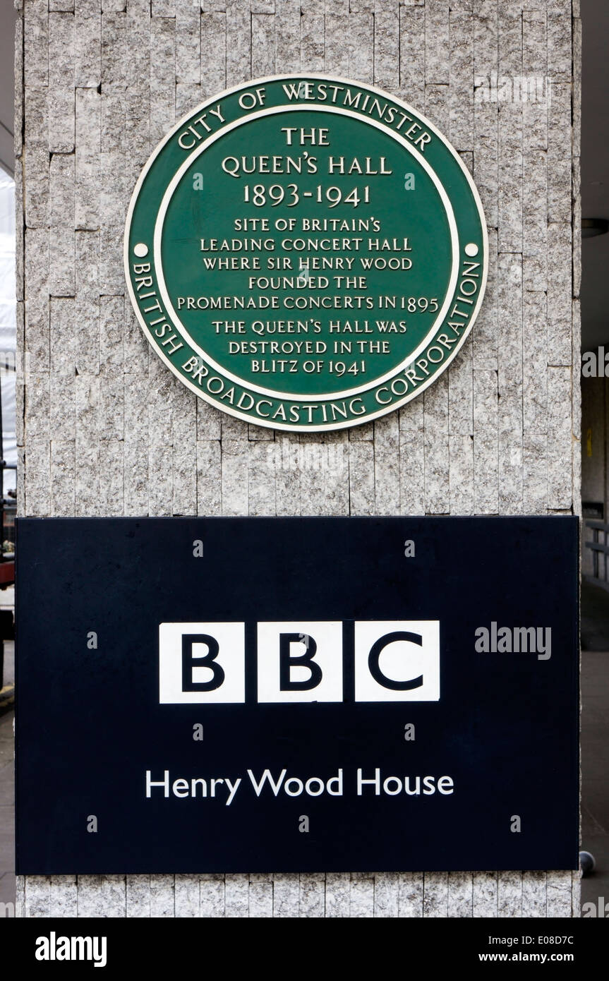 Plaque commemorating the Queen's Hall, the venue for the Henry Wood Promenade Concerts, on Henry Wood House at the BBC. Stock Photo