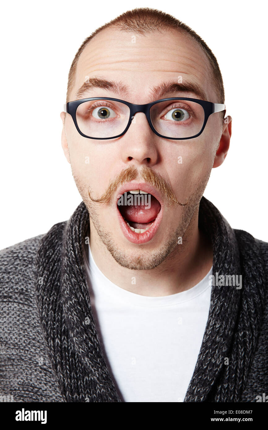 Surprised young man with eyes wide open. Facial expression Stock Photo Alamy