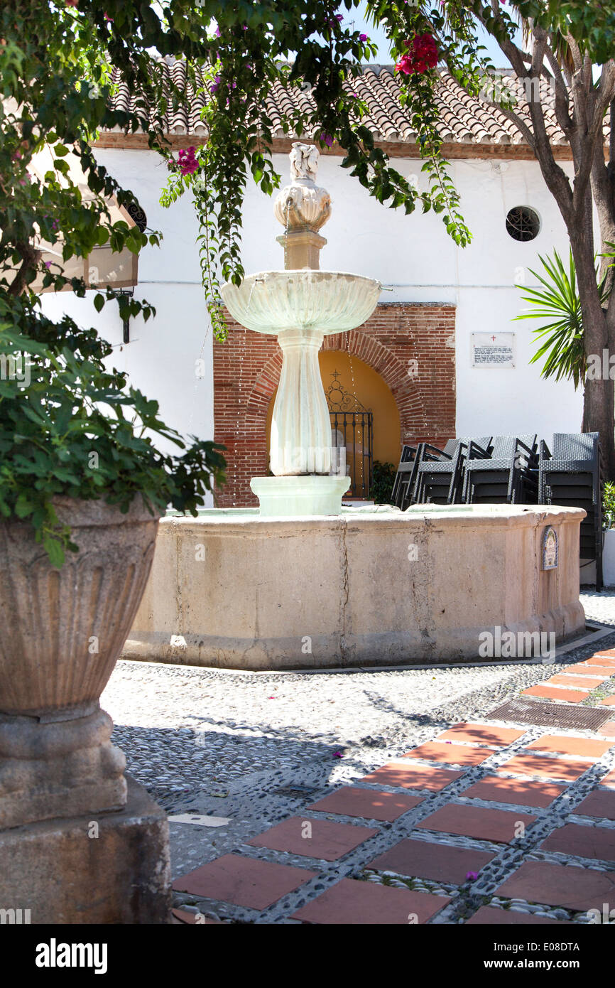 Old fountain located at Plaza de los Naranjos in Marbella Old Town ...