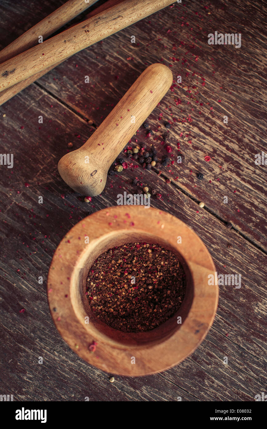 Fresh pepper, mortar and pestle Stock Photo Alamy