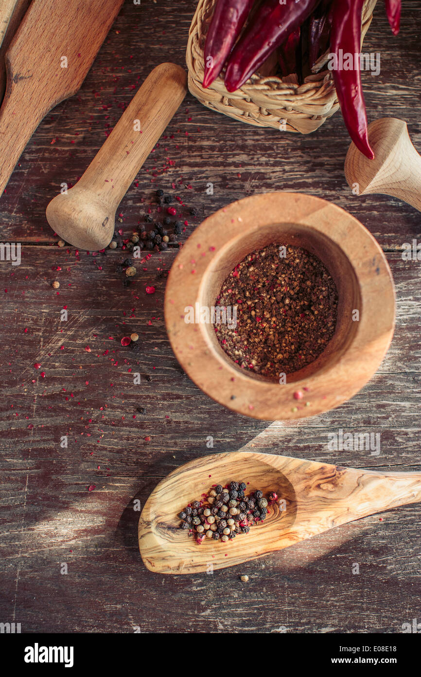 Fresh pepper, mortar and pestle Stock Photo Alamy