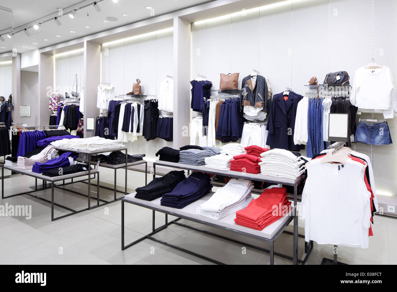 luxury and fashionable brand new interior of cloth store Stock Photo - Alamy