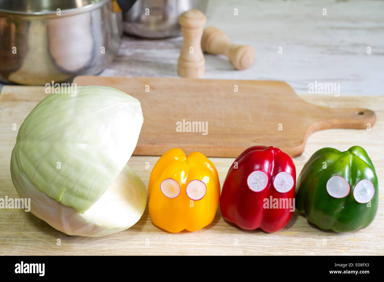 Abstract food creative concept with cabbage and peppers in the kitchen Stock Photo