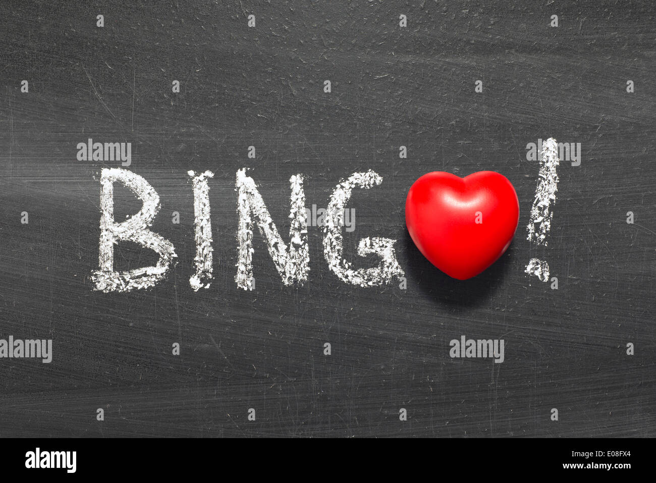 bingo word handwritten on chalkboard with heart symbol instead of O Stock Photo