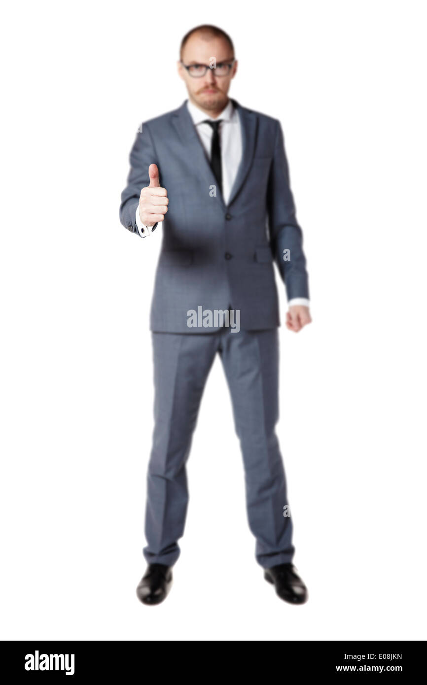 Young businessman shows ok sign. Thumbs up Stock Photo