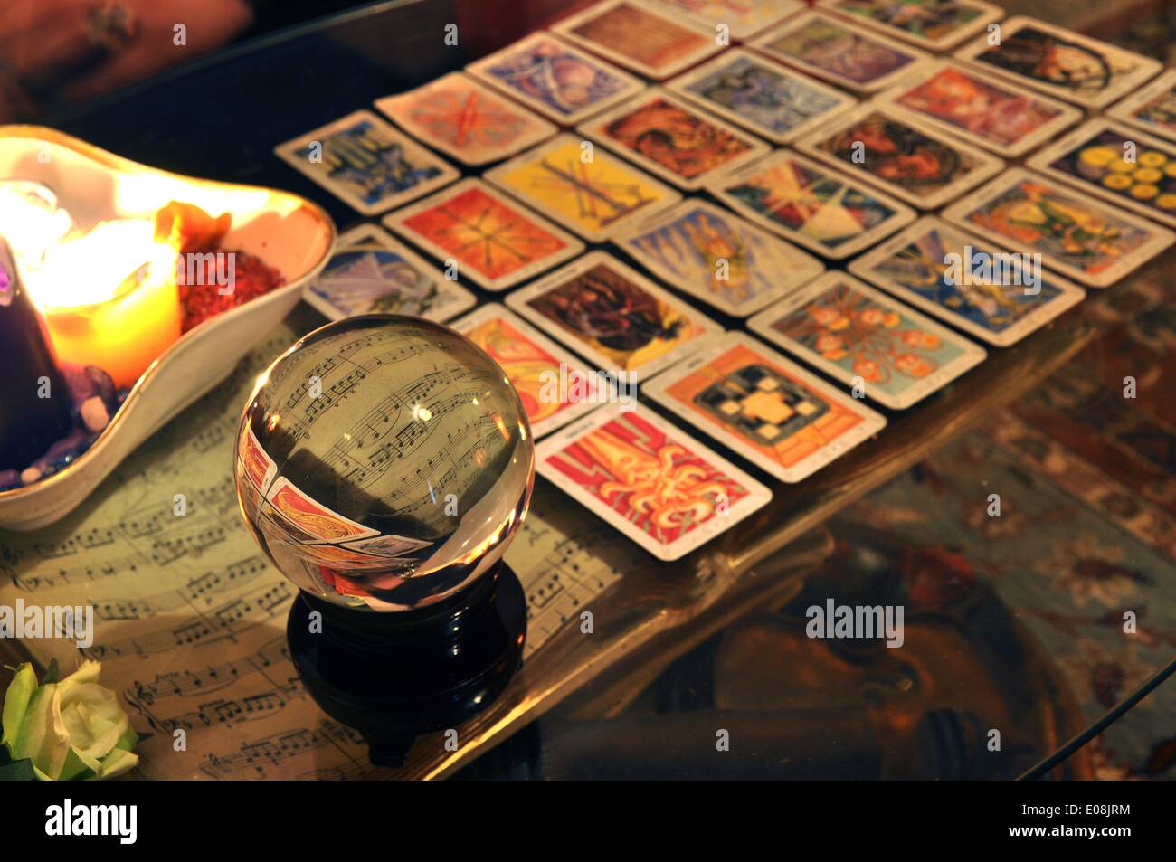 Berlin, Germany. 18th Feb, 2013. Tarot cards lie next to a crystal ball and notes in Berlin, Germany, 18 February 2013. Fotoarchiv für Zeitgeschichte - NO WIRE SERVICE/dpa/Alamy Live News Stock Photo