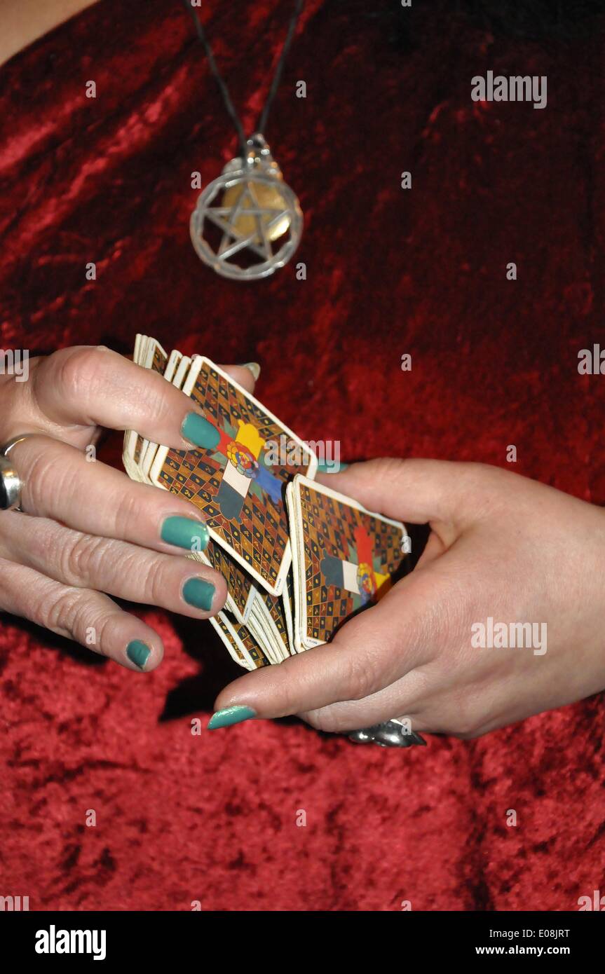 Berlin, Germany. 18th Feb, 2013. A fortune teller holds tarot cards in Berlin, Germany, 18 February 2013. Fotoarchiv für Zeitgeschichte - NO WIRE SERVICE/dpa/Alamy Live News Stock Photo