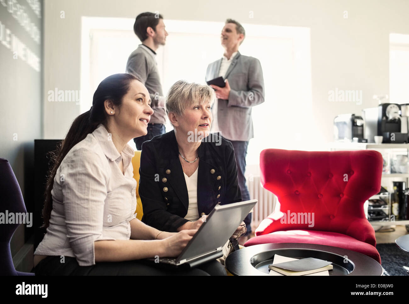 Business people at office lobby Stock Photo - Alamy