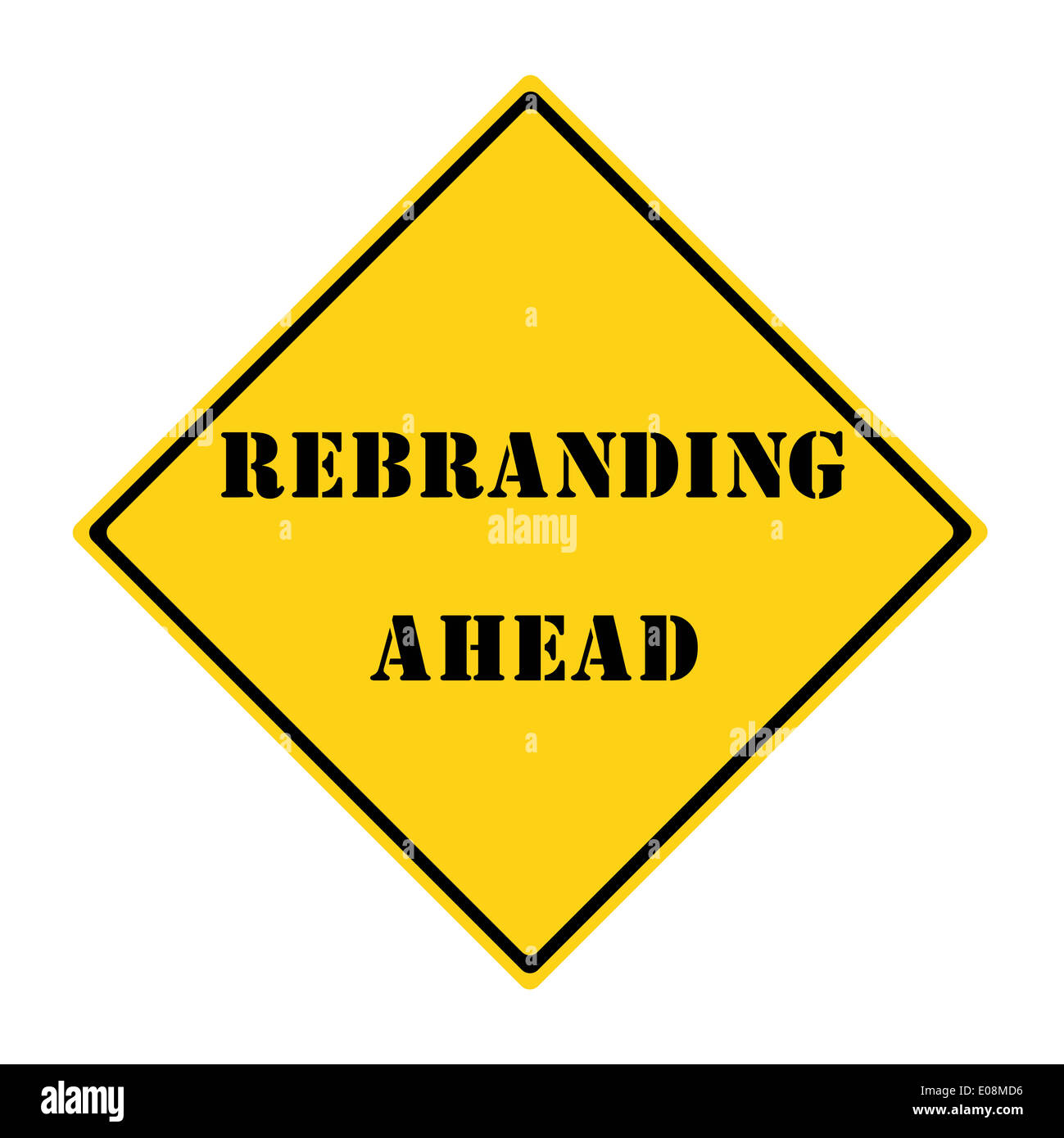 A yellow and black diamond shaped road sign with the words REBRANDING ...