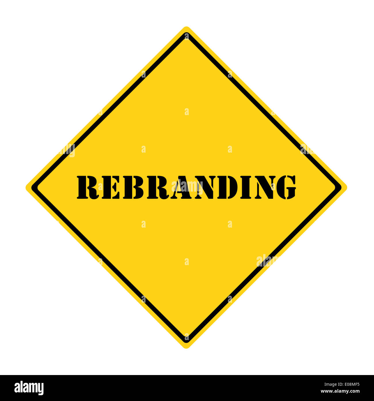 A yellow and black diamond shaped road sign with the word REBRANDING making a great concept. Stock Photo