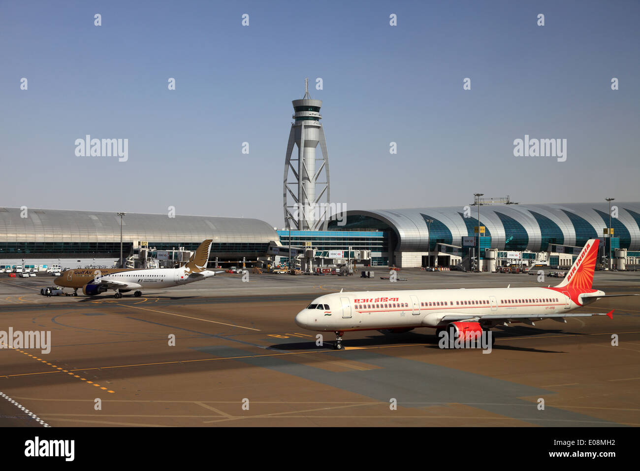 Air India and Gulf Air airplanes at Dubai Airport, UAE Stock Photo