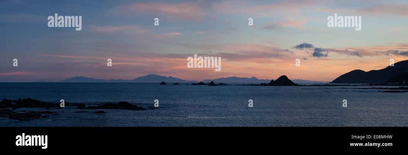 Panorama with Kaikoura Ranges in South Island at sunset from Wellington, North Island, New Zealand, Pacific Stock Photo