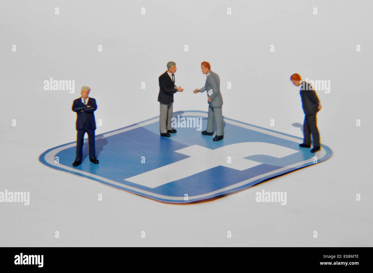 Illustration - Midget figures stand on a facebook logo in Germany, 11 June 2011. Fotoarchiv für Zeitgeschichte - NO WIRE SERVICE Stock Photo