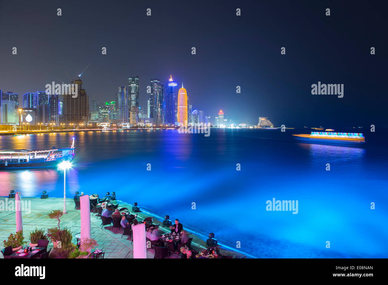 New skyline of the West Bay central financial district of Doha at night, Qatar, Middle East Stock Photo