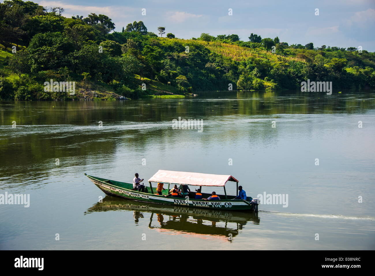 Boat with tourists shipping around the source of the Nile, Jinja, Uganda, East Africa, Africa Stock Photo