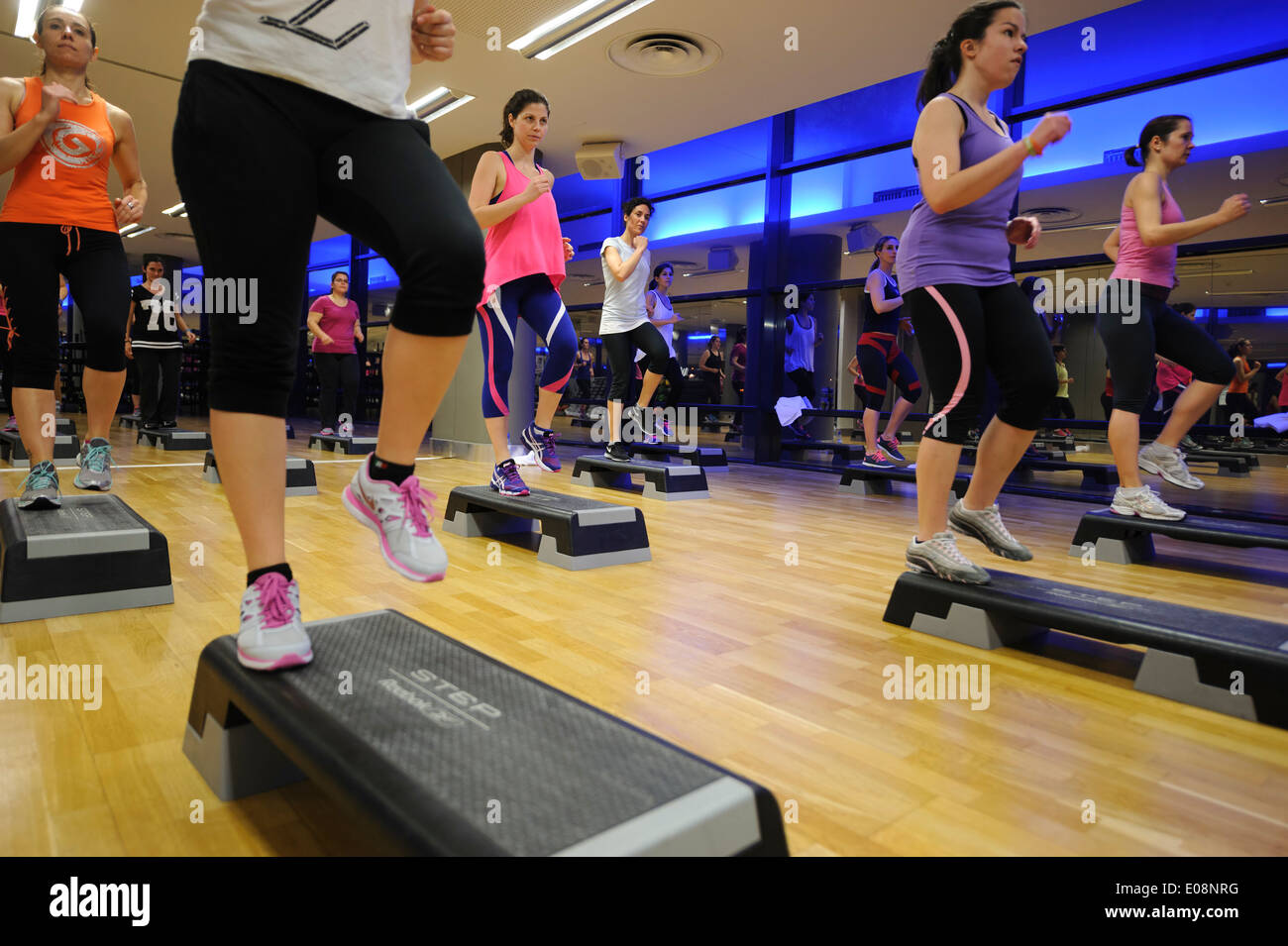 Step aerobics fitness class at the gym Stock Photo