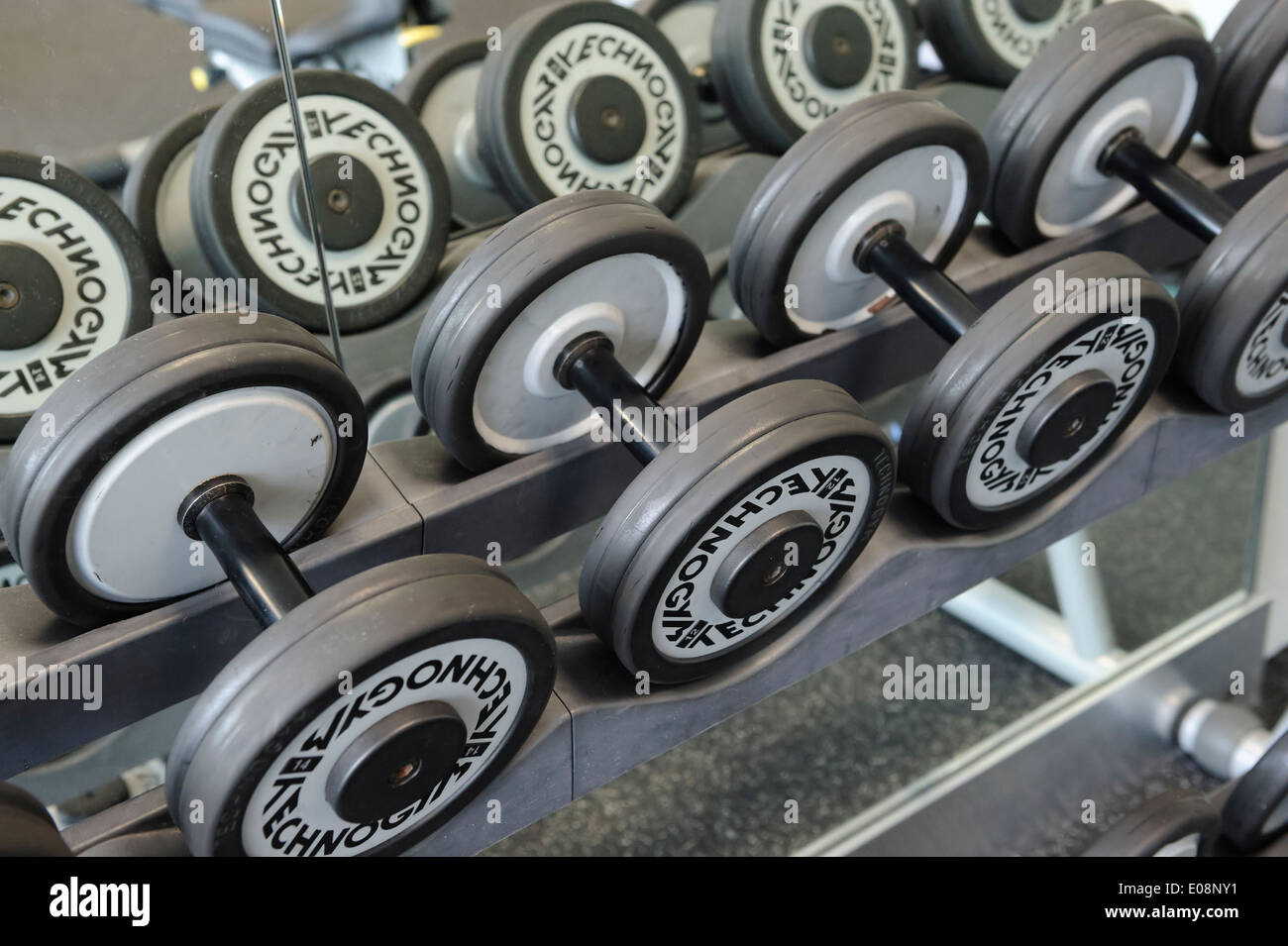 Rack of dumbbells at gym Stock Photo