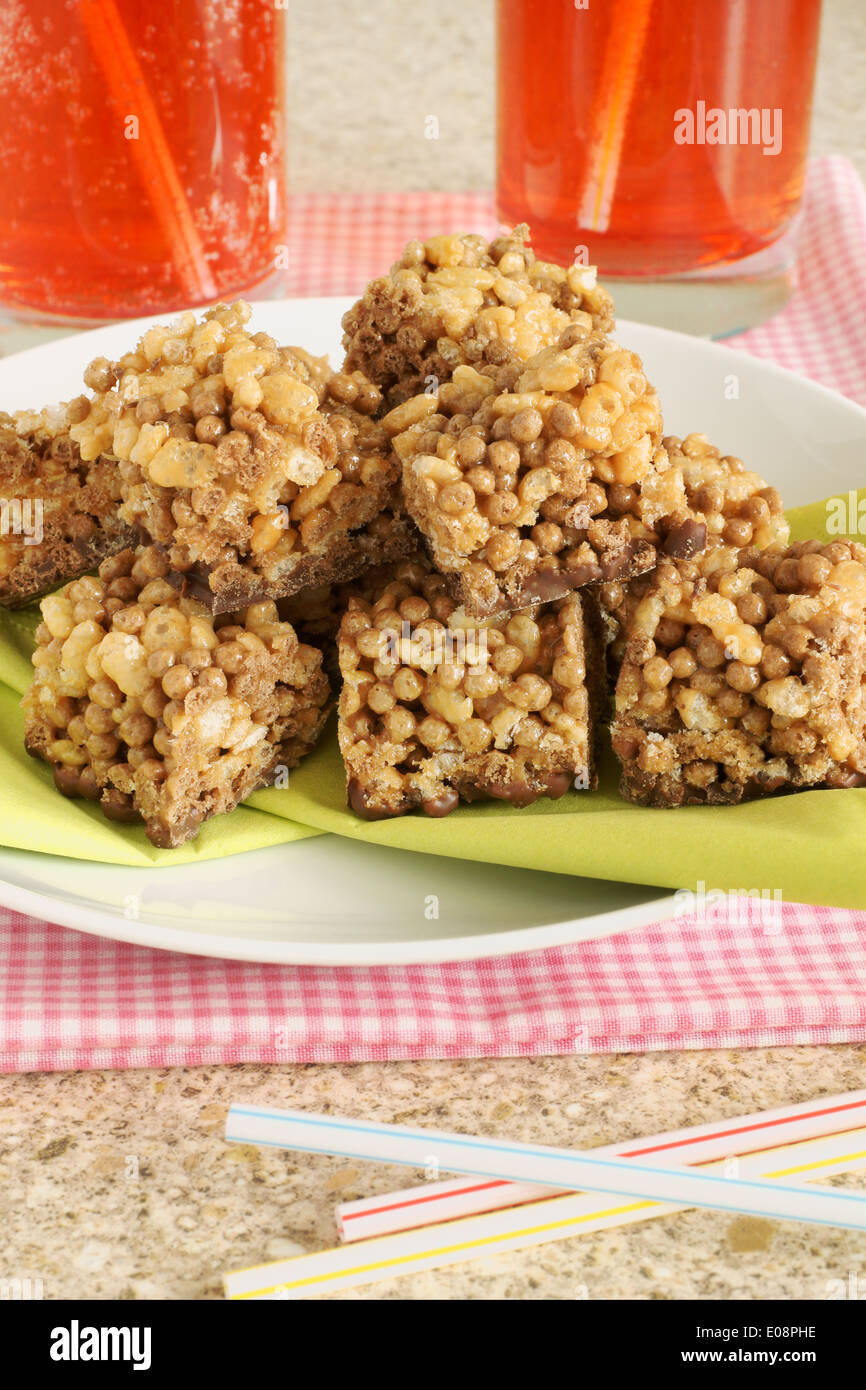 Caramel and chocolate rice krispie cakes Stock Photo Alamy