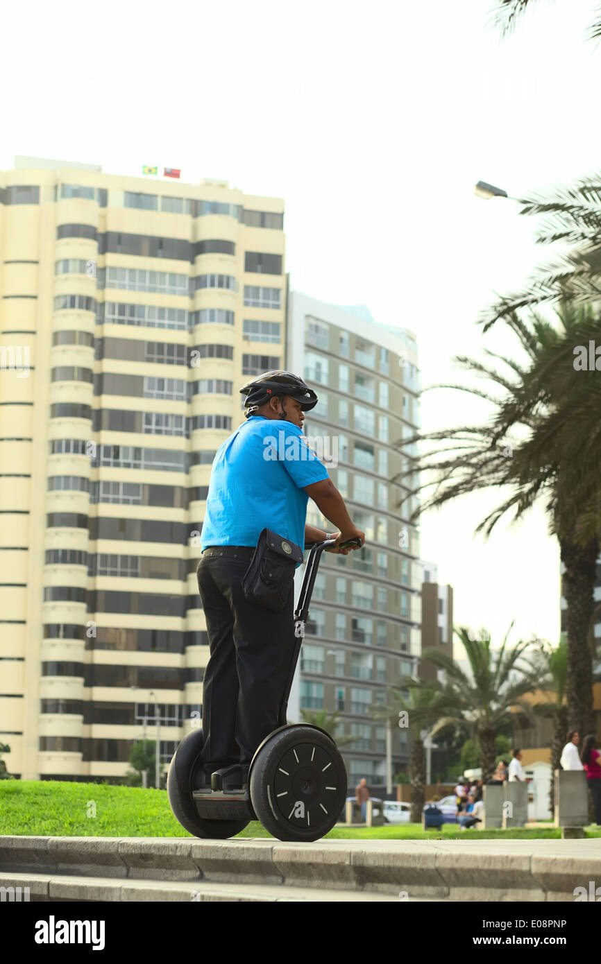 Unidentified public security guard (serenazgo) on a Segway PT two-wheeled electric vehicle Stock Photo