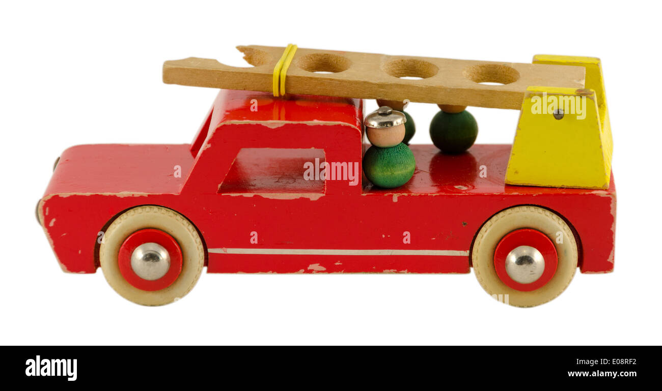 antique wooden fire-engine  toy isoalted on white background Stock Photo