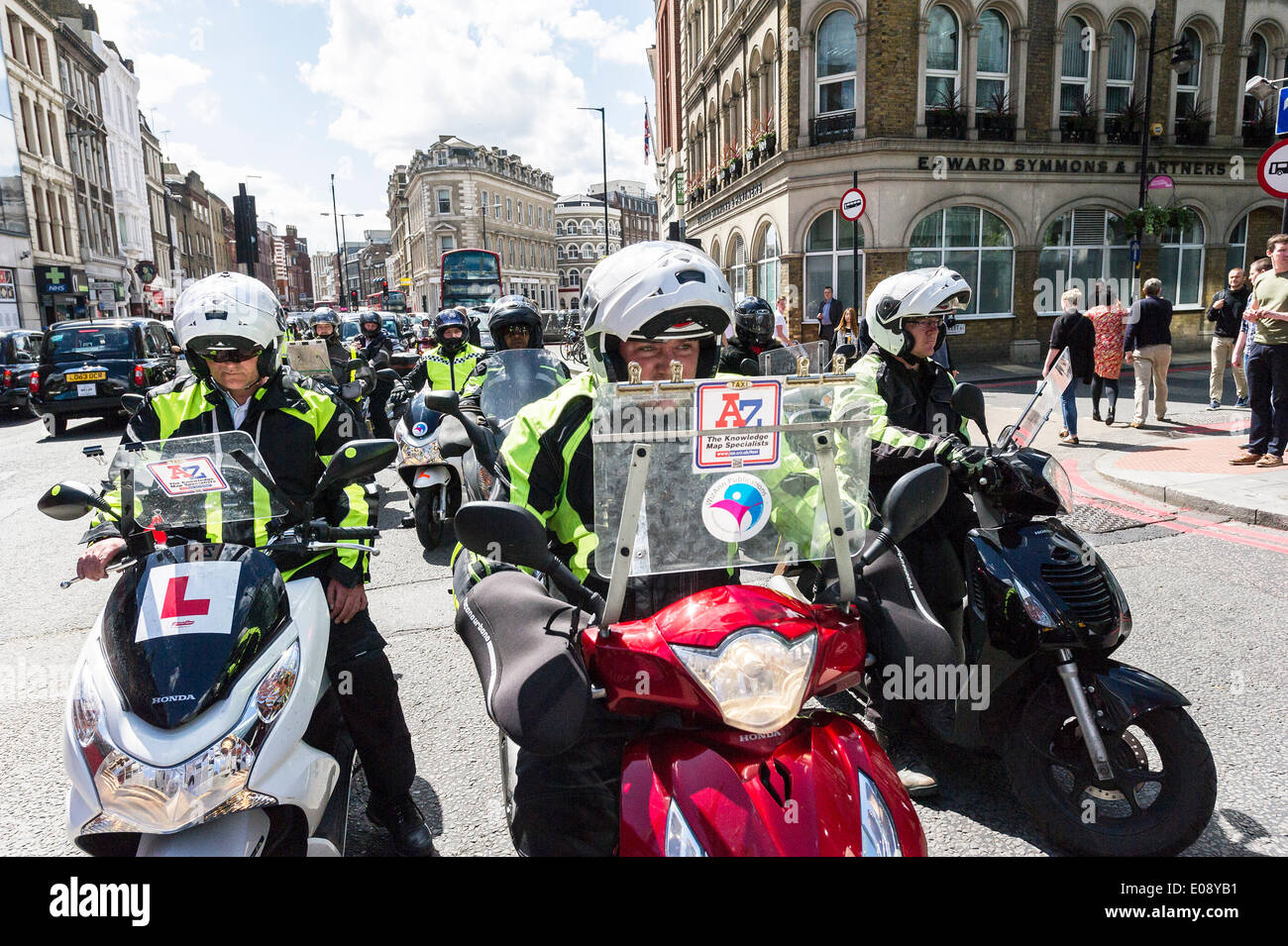 London, UK. 6th May 2014, Trainee cab drivers participate in the demonstration jamming the streets of Southwark in protest over the refusal to place a Black Cab taxi rank outside the entrance to The Shard. Photographer:  Gordon Scammell/Alamy Live News Stock Photo