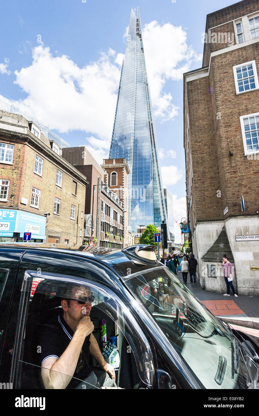 London, UK. 6th May 2014, A taxi dirver participates in the demonstration in the streets aropund The Shard.  Photographer:  Gordon Scammell/Alamy Live News Stock Photo
