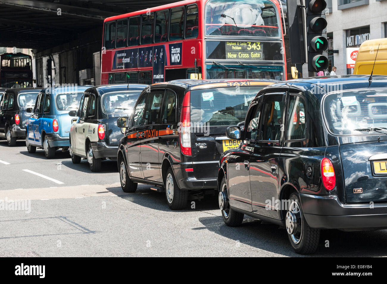 London, UK. 6th May 2014, Taxis bring chaos to the streets of Southwark in protest over the refusal to place a Black Cab taxi rank outside the entrance to The Shard. Photographer:  Gordon Scammell/Alamy Live News Stock Photo