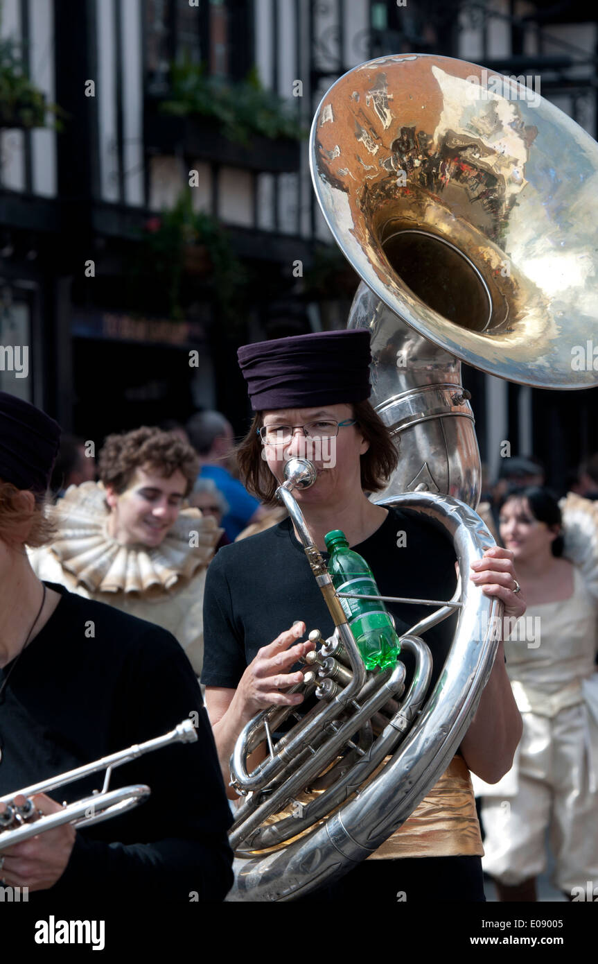 Woman playing a sousaphone in the Shakespeare birthday celebrations procession, Stratford-upon-Avon, UK Stock Photo