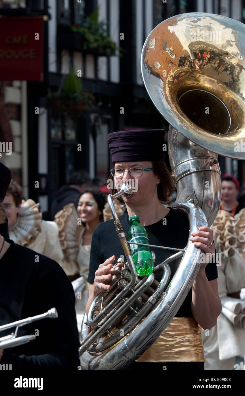 Woman playing a sousaphone in the Shakespeare birthday celebrations procession, Stratford-upon-Avon, UK Stock Photo