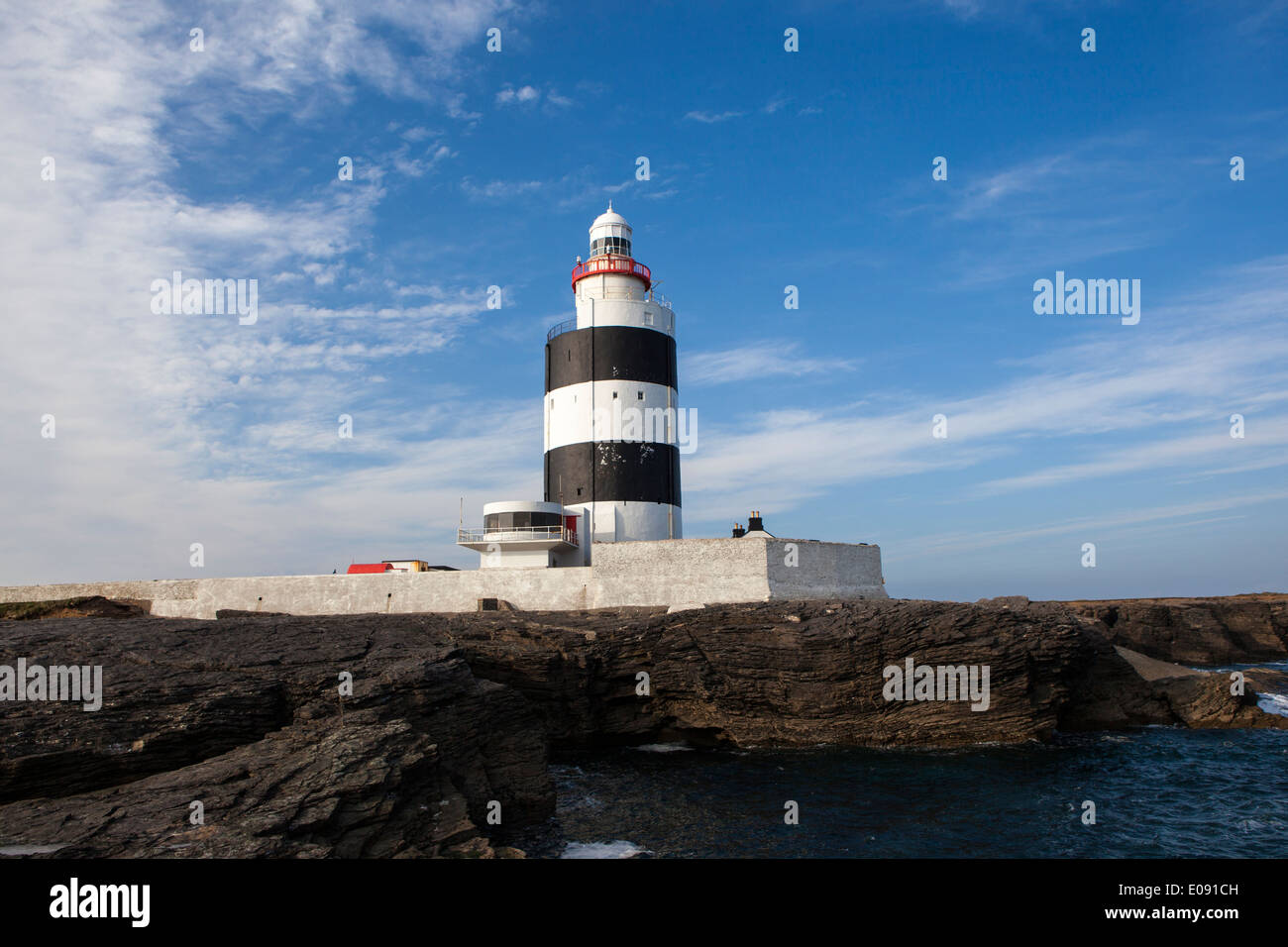 The Hook Lighthouse, Fethard on Sea, Wexford, Ireland is one of the oldest lighthouses in the world. Stock Photo