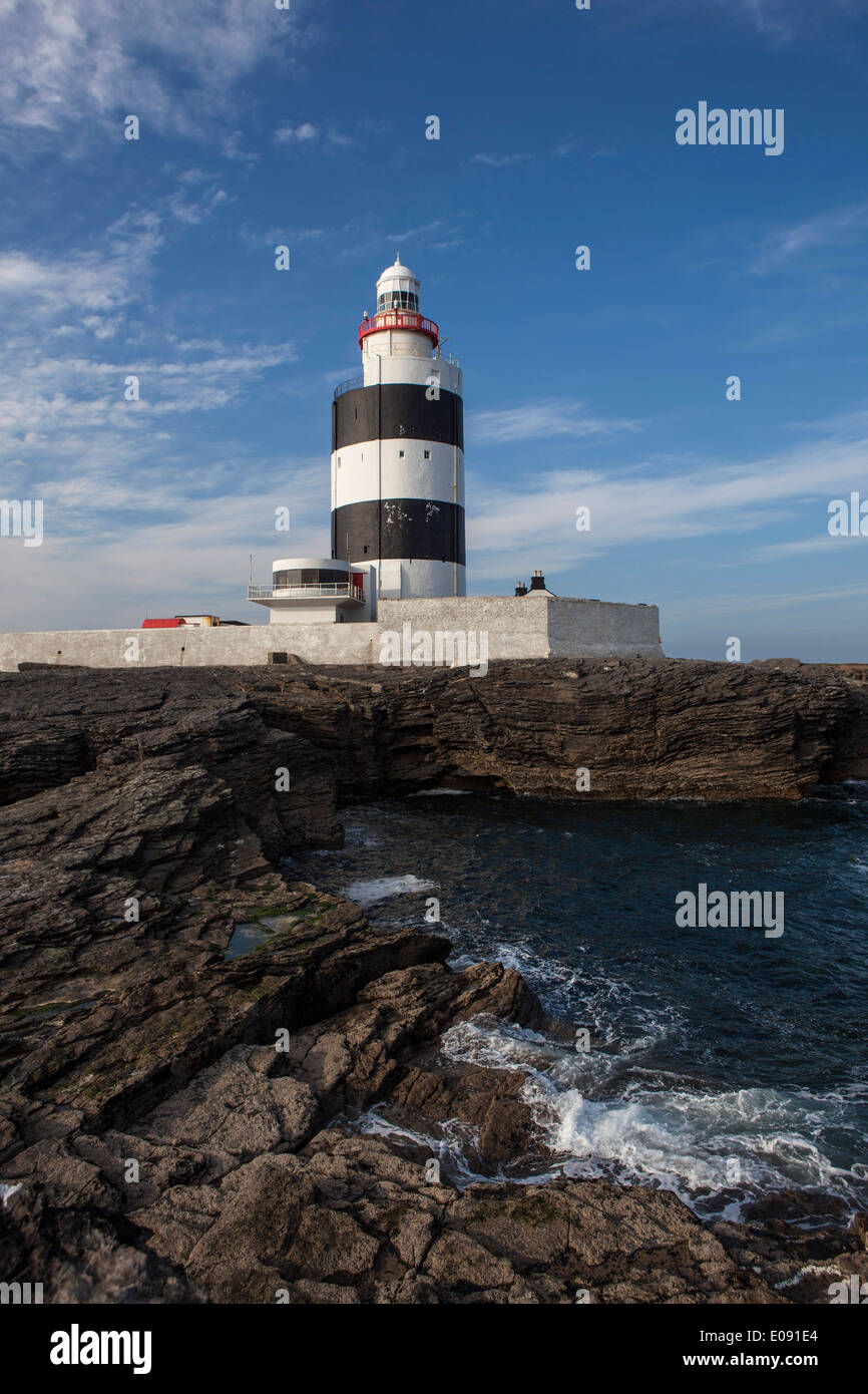 The Hook Lighthouse, Fethard on Sea, Wexford, Ireland is one of the oldest lighthouses in the world. Stock Photo
