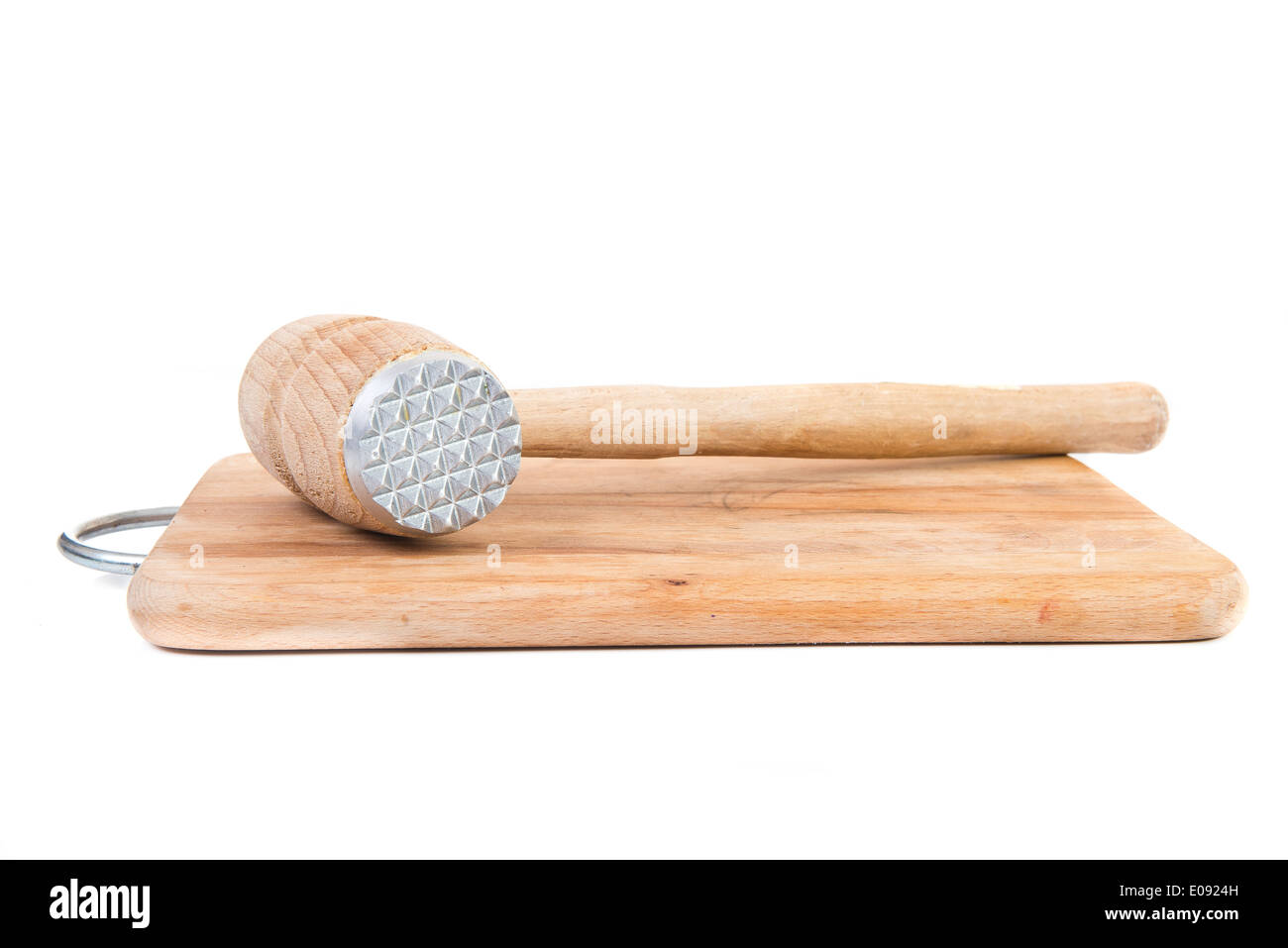 meat tenderizer and board on white background Stock Photo