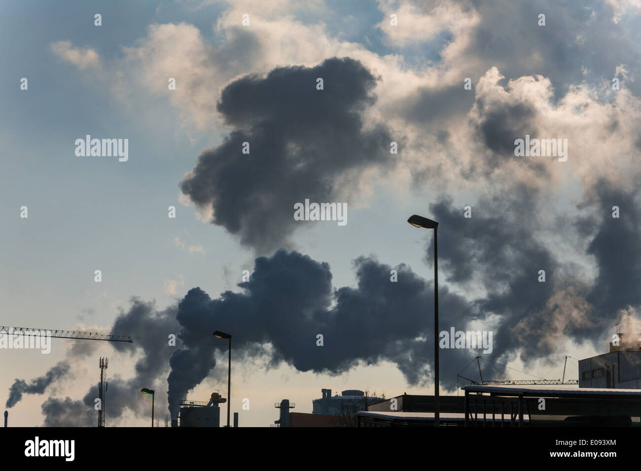 Chimney of an industrial company with smoke. Symbolic photo fue environment protection and ozone., Schlot eines Industriebetrieb Stock Photo