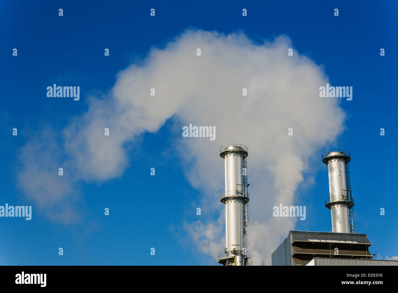 Chimney of an industrial company mikt smoke. Symbolic photo fue environment protection and ozone., Schlot eines Industriebetrieb Stock Photo