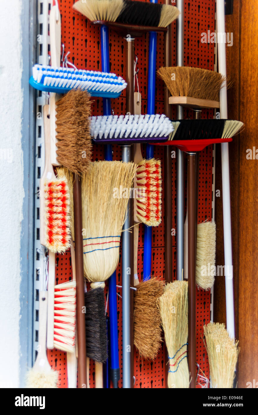 Cupboard with different kinds of broom, Schrank mit verschiedenen Arten von Besen Stock Photo
