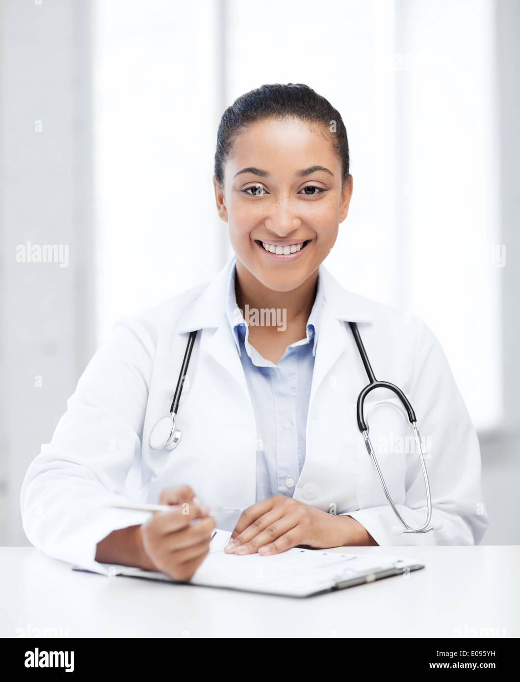 female doctor writing prescription Stock Photo - Alamy