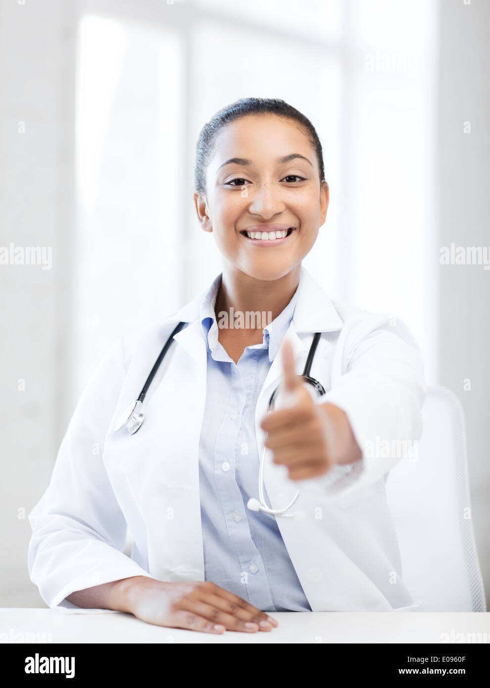 Thumbs up young african doctor hi-res stock photography and images - Alamy